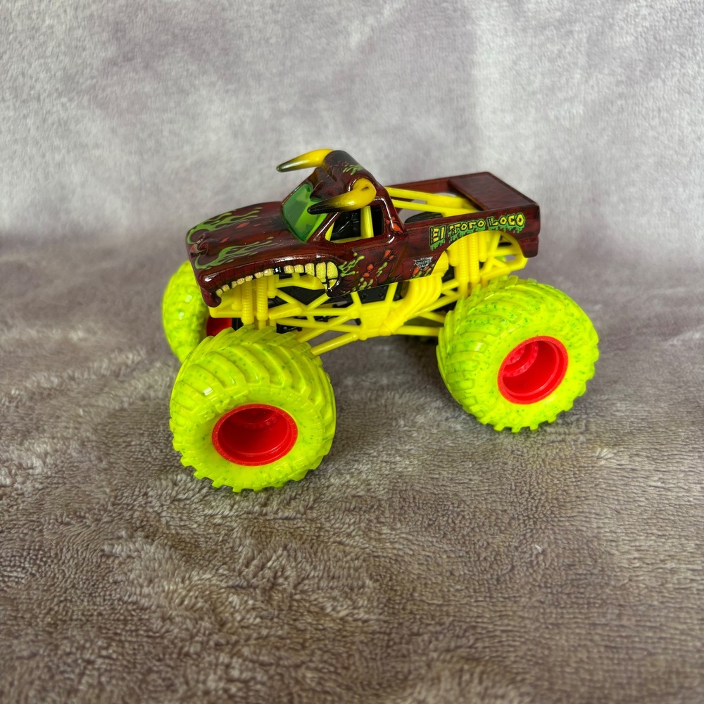 Monster Jam El Toro Loco Monster Truck Maroon Green Flames Neon Tires 2020